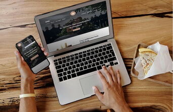 A laptop and a smartphone display a user-friendly website with a responsive design optimized for mobile devices.